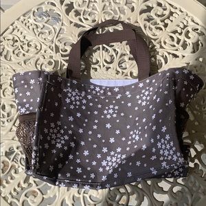 Thirty one brown bag with flowers on it
